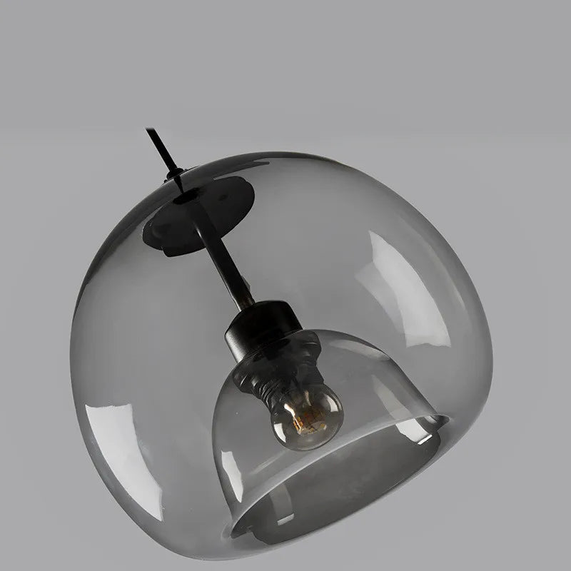 Szklana lampa wisząca – podwójny klosz w industrialnym stylu
