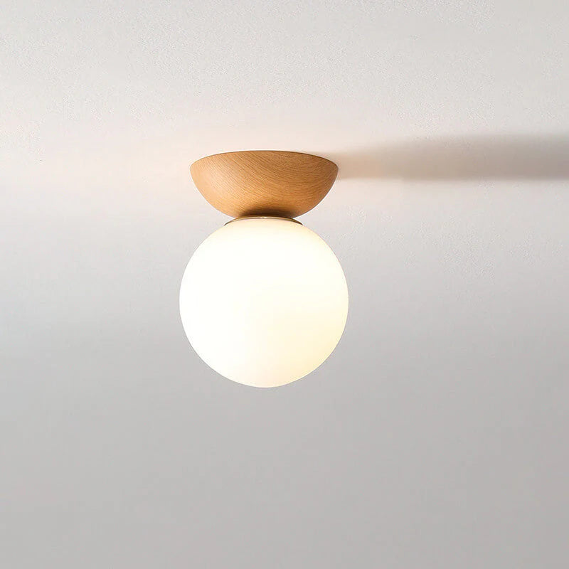 Nowoczesna lampa sufitowa w japońskim stylu z drewnianą bazą – minimalistyczna kula