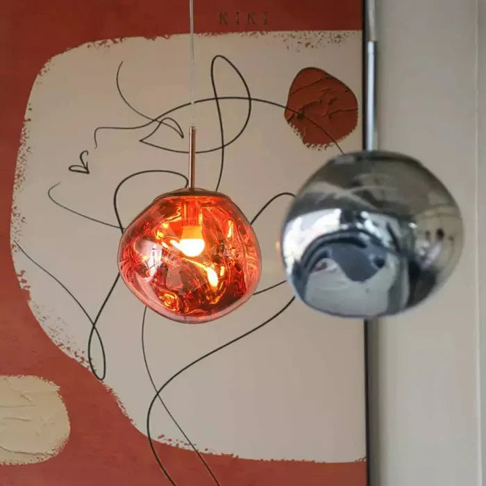 Designerska lampa wisząca topiona kula LED