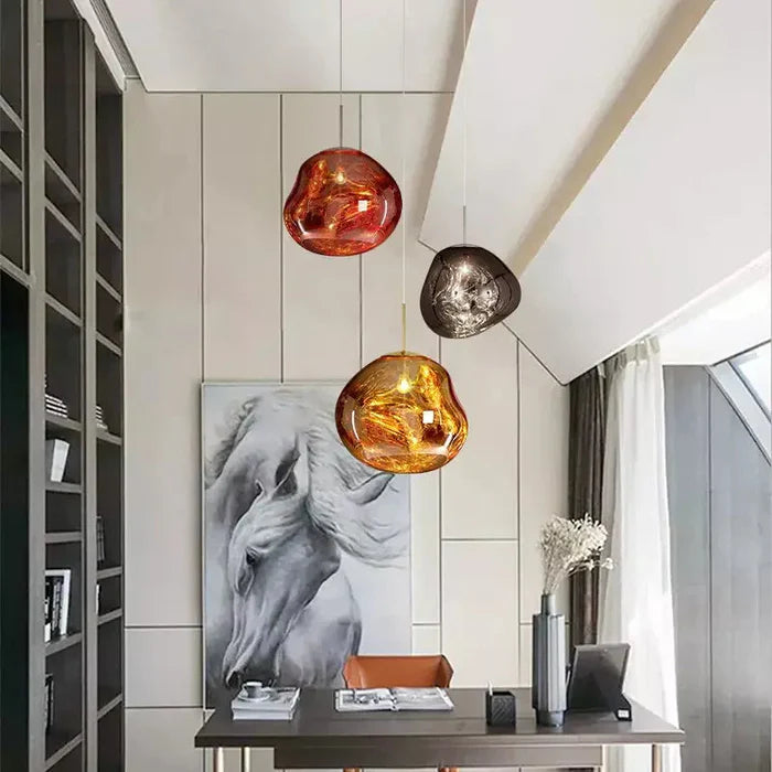 Designerska lampa wisząca topiona kula LED