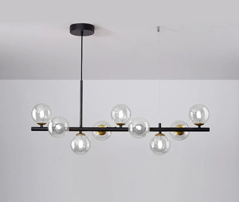 Nowoczesna lampa wisząca z kulistymi kloszami