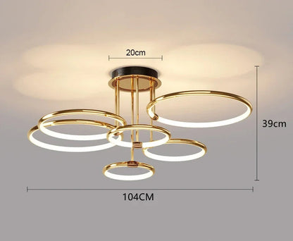 Nowoczesny żyrandol LED z pierścieniami – Złota lampa sufitowa z geometryczną formą
