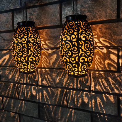 Solarny lampion ogrodowy LED – dekoracyjna latarnia z efektem wzoru cieni, do użytku zewnętrznego
