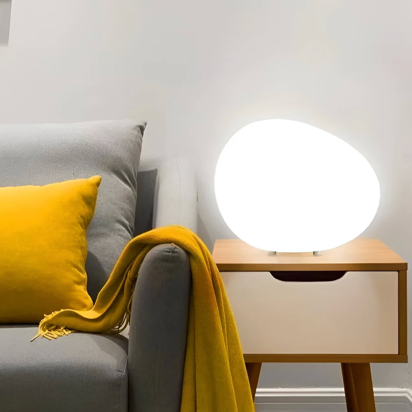 Lampka stołowa w kształcie kamienia – minimalistyczna elegancja w organicznej formie