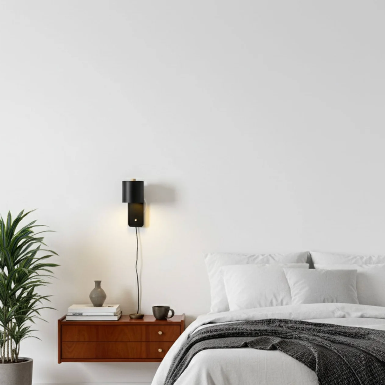 Minimalistyczna kinkietowa lampa ścienna z regulowanym kloszem