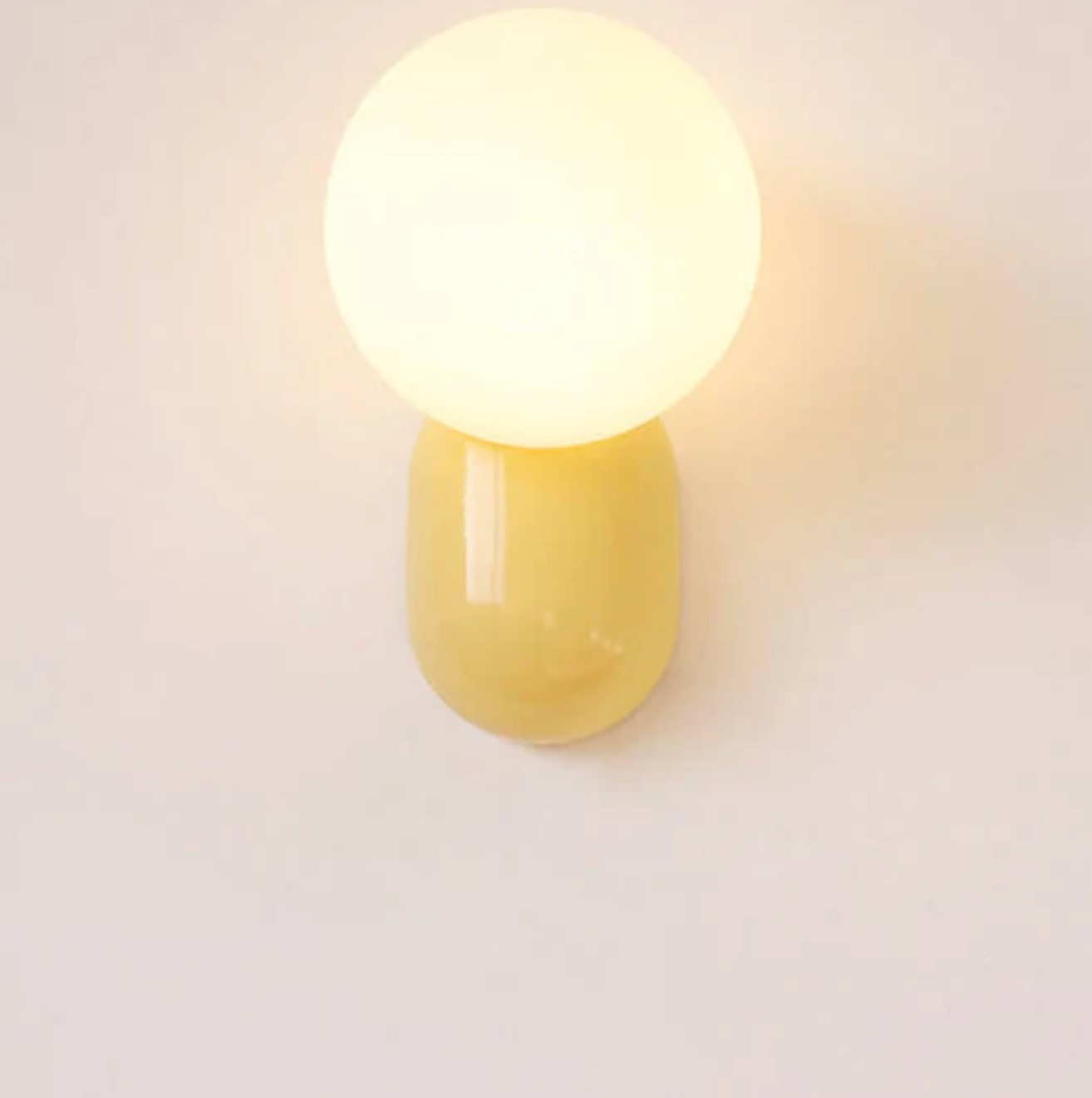 Nowoczesny kinkiet kula LED – designerska lampa ścienna