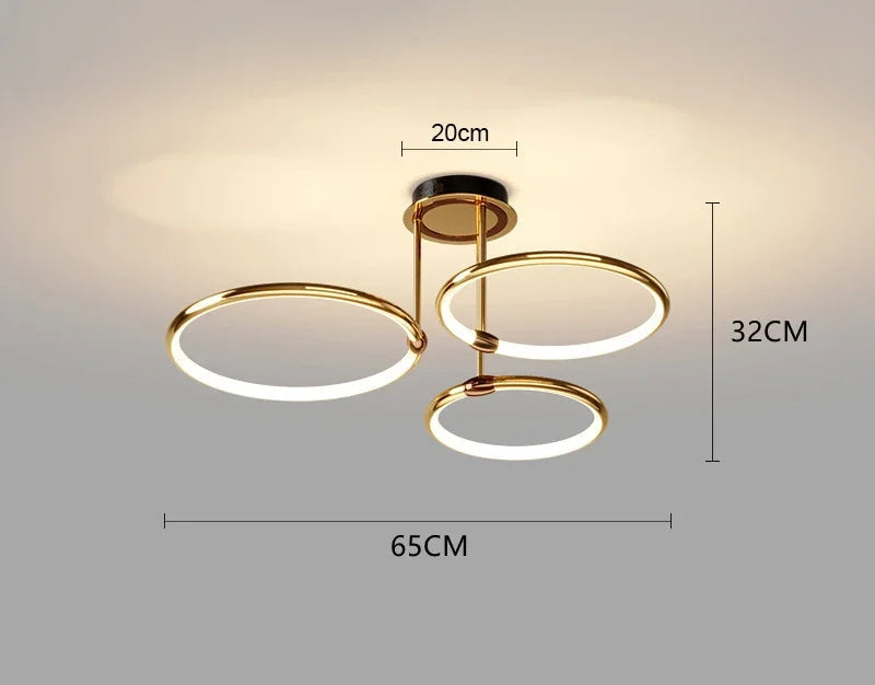 Nowoczesny żyrandol LED z pierścieniami – Złota lampa sufitowa z geometryczną formą
