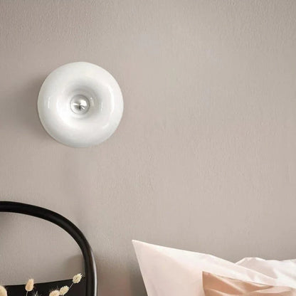 Lampa ścienna LED „donut” – designerska oprawa oświetleniowa z efektem świetlnej aureoli