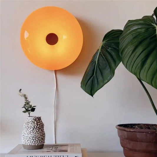 Lampa ścienna LED „donut” – designerska oprawa oświetleniowa z efektem świetlnej aureoli