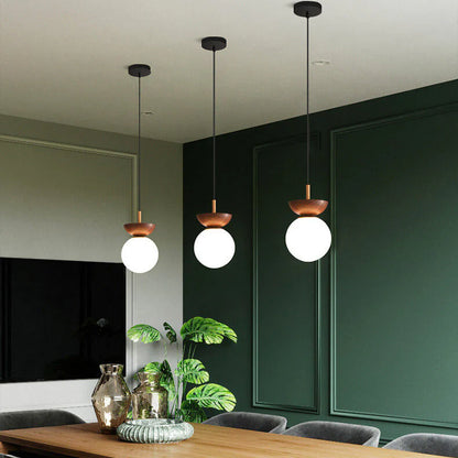 Nowoczesna lampa sufitowa w japońskim stylu  z drewnianą bazą – minimalistyczna kula