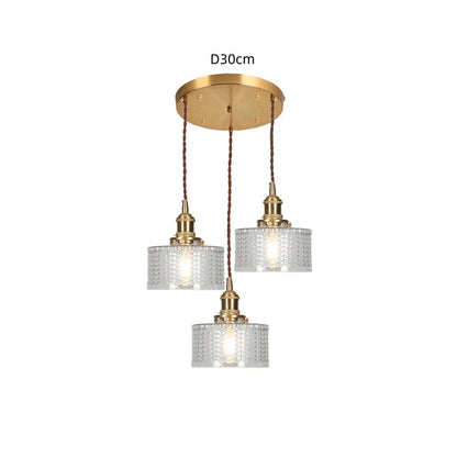 Szklana lampa wisząca w stylu vintage z ryflowanym kloszem i złotym wykończeniem