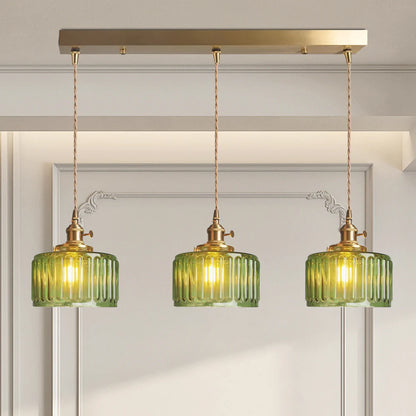 Szklana lampa wisząca w stylu vintage z ryflowanym kloszem i złotym wykończeniem
