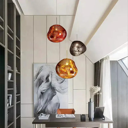 Designerska lampa wisząca topiona kula LED