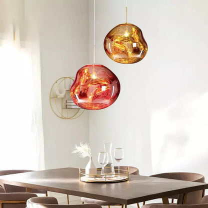 Designerska lampa wisząca topiona kula LED