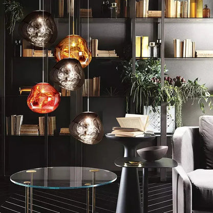 Designerska lampa wisząca topiona kula LED