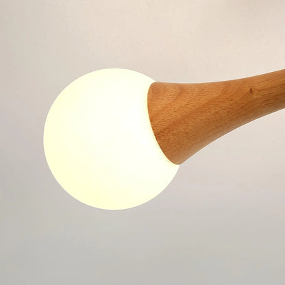 Nowoczesna lampa sufitowa żyrandol z drewnianymi ramionami i kulistymi kloszami