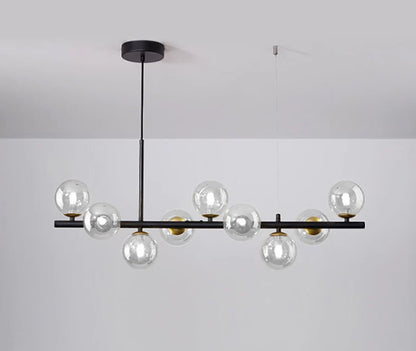 Nowoczesna lampa wisząca z kulistymi kloszami